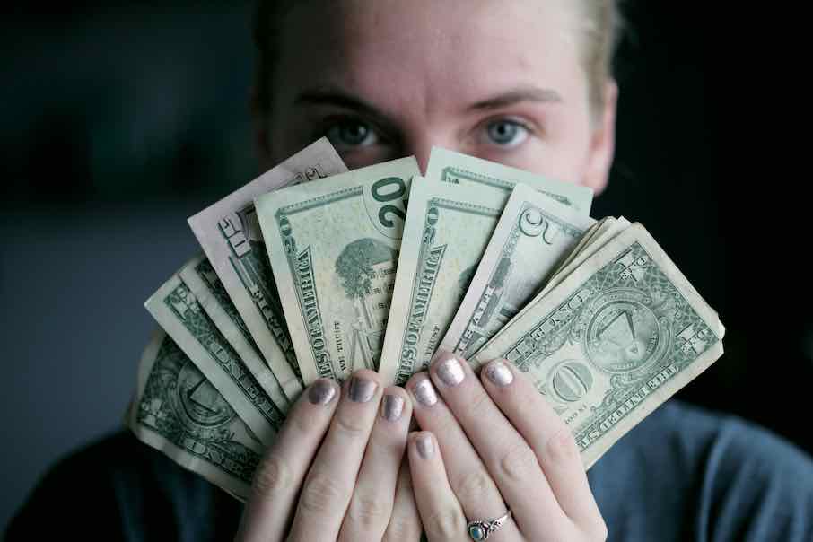 Yacht Steward Holding Dollars